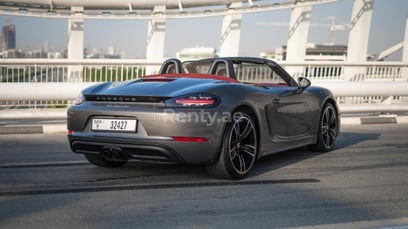 Grey Porsche Boxster for rent in Dubai 1