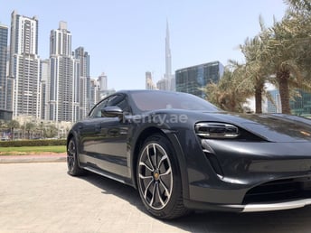 Grey Porsche Taycan for rent in Dubai 2
