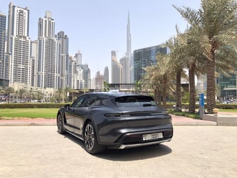 Grey Porsche Taycan for rent in Dubai 3