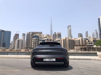 Grey Porsche Taycan for rent in Dubai 4
