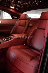 Maroon Rolls Royce Wraith Black Badge for rent in Dubai 0