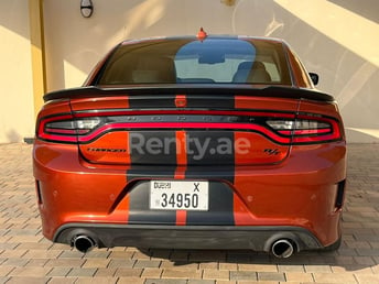 Orange Dodge Charger v8 SRT KIT for rent in Dubai 6