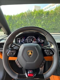Orange Lamborghini Evo for rent in Dubai 4