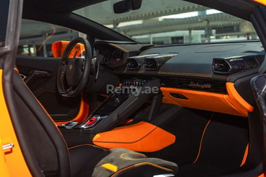 Orange Lamborghini Huracan for rent in Dubai 6