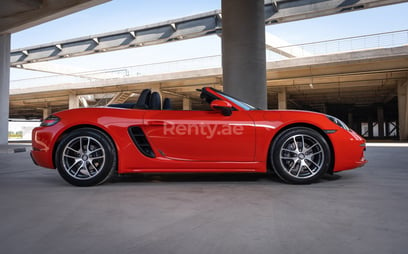 Orange Porsche Boxster 718 for rent in Dubai 2