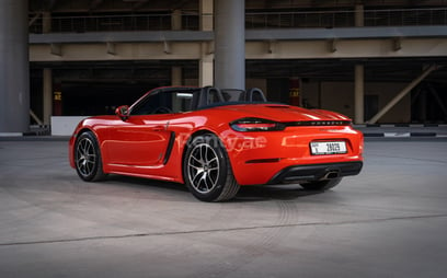 Orange Porsche Boxster 718 for rent in Dubai 3