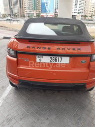 在Abu-Dhabi租赁橙子 Range Rover Evoque 1