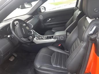 Orange Range Rover Evoque for rent in Sharjah 3