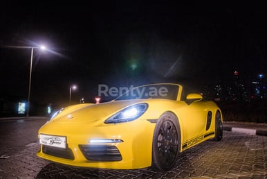 Yellow Porsche Boxster 718 for rent in Sharjah 3