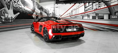 Red Audi R8 spyder for rent in Abu-Dhabi 2