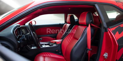 Red Dodge Challenger for rent in Dubai 1