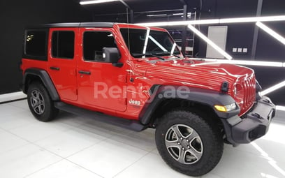 Red Jeep Wrangler for rent in Dubai