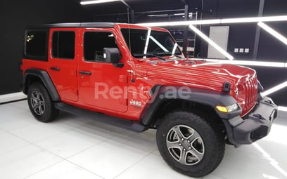 Rouge Jeep Wrangler en location à Dubai