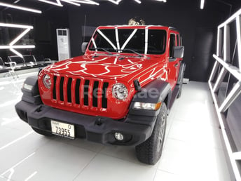 Red Jeep Wrangler for rent in Dubai 0