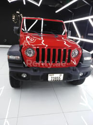 Red Jeep Wrangler for rent in Dubai 1