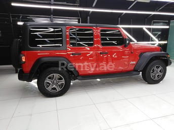 Red Jeep Wrangler for rent in Dubai 2