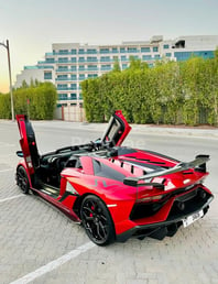 Red Lamborghini Aventador SVJ Spyder for rent in Dubai 1