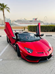 Red Lamborghini Aventador SVJ Spyder for rent in Dubai 4