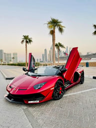Red Lamborghini Aventador SVJ Spyder for rent in Dubai 5