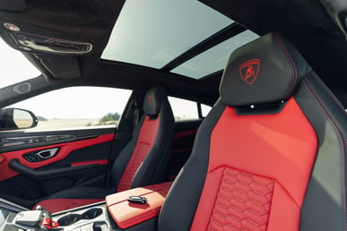 Red Lamborghini Urus for rent in Abu-Dhabi 2