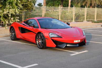 Red McLaren 570S for rent in Dubai 0