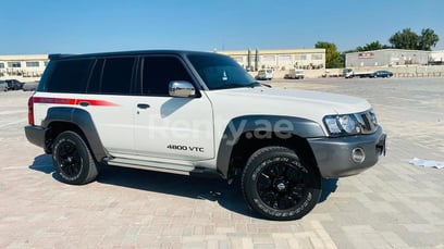 White Nissan Patrol Super Safari for rent in Dubai 0