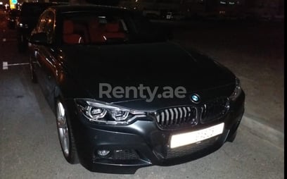 Silver BMW 320 for rent in Abu-Dhabi