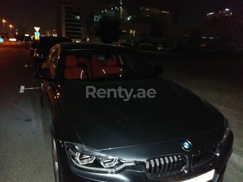 Silver BMW 320 for rent in Abu-Dhabi 2