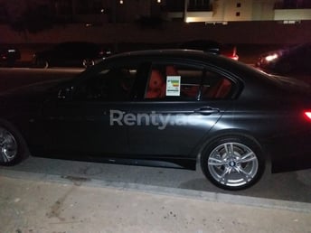 Silver BMW 320 for rent in Sharjah 5