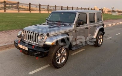 Silver Jeep Wrangler for rent in Dubai