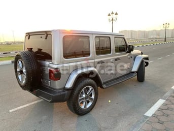 Silver Jeep Wrangler for rent in Dubai 0