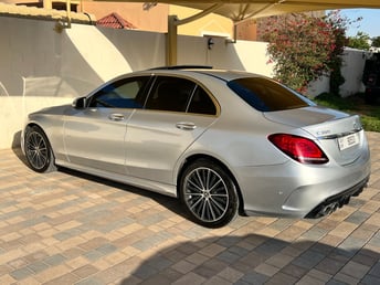 Silver Mercedes C Class C43 AMG KIT for rent in Sharjah 4