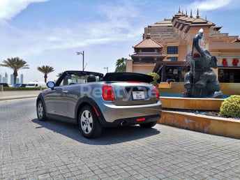 Silver Mini Cooper cabrio for rent in Dubai 0