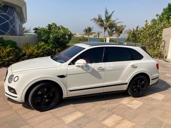 White Bentley Bentayga for rent in Dubai 2