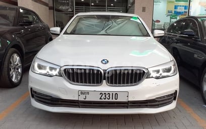 White BMW 520i for rent in Sharjah