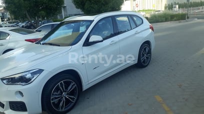 White BMW X1 for rent in Dubai 6