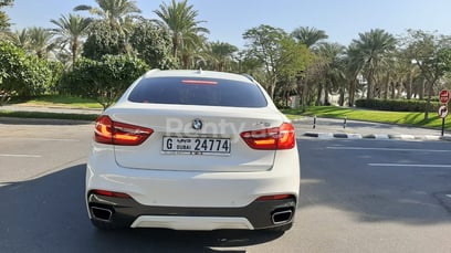 White BMW X6 M power Kit V8 for rent in Abu-Dhabi 3