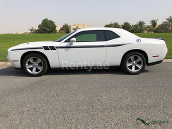 White Dodge Challenger for rent in Dubai 1