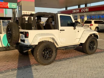 White Jeep Wrangler for rent in Dubai 1