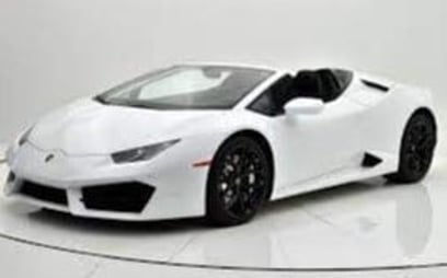 在Abu-Dhabi租赁白色 Lamborghini Huracan Spyder