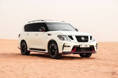 White Nissan Patrol V8 with Nismo Bodykit for rent in Dubai 3