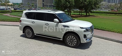 White Nissan Patrol for rent in Dubai 3