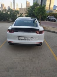 White Porsche Panamera for rent in Abu-Dhabi 3