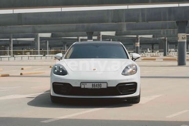 White Porsche Panamera for rent in Abu-Dhabi 0