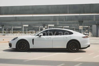 White Porsche Panamera for rent in Abu-Dhabi 1