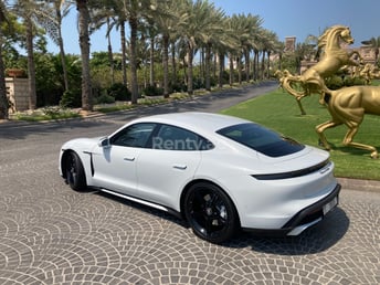 White Porsche Taycan Turbo S for rent in Dubai 2