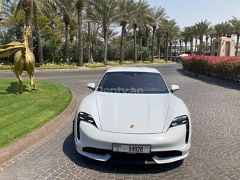 White Porsche Taycan Turbo S for rent in Dubai 3