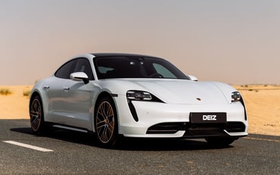 White Porsche Taycan Turbo for rent in Dubai