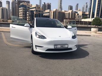 White Tesla Model Y Long Range for rent in Dubai 2
