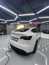 White Tesla Model Y Long Range for rent in Dubai 1